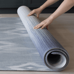 Unrolling Memory foam mat in blue and beige ikat print that looks modern in family homes perfect squishy surface for the whole family