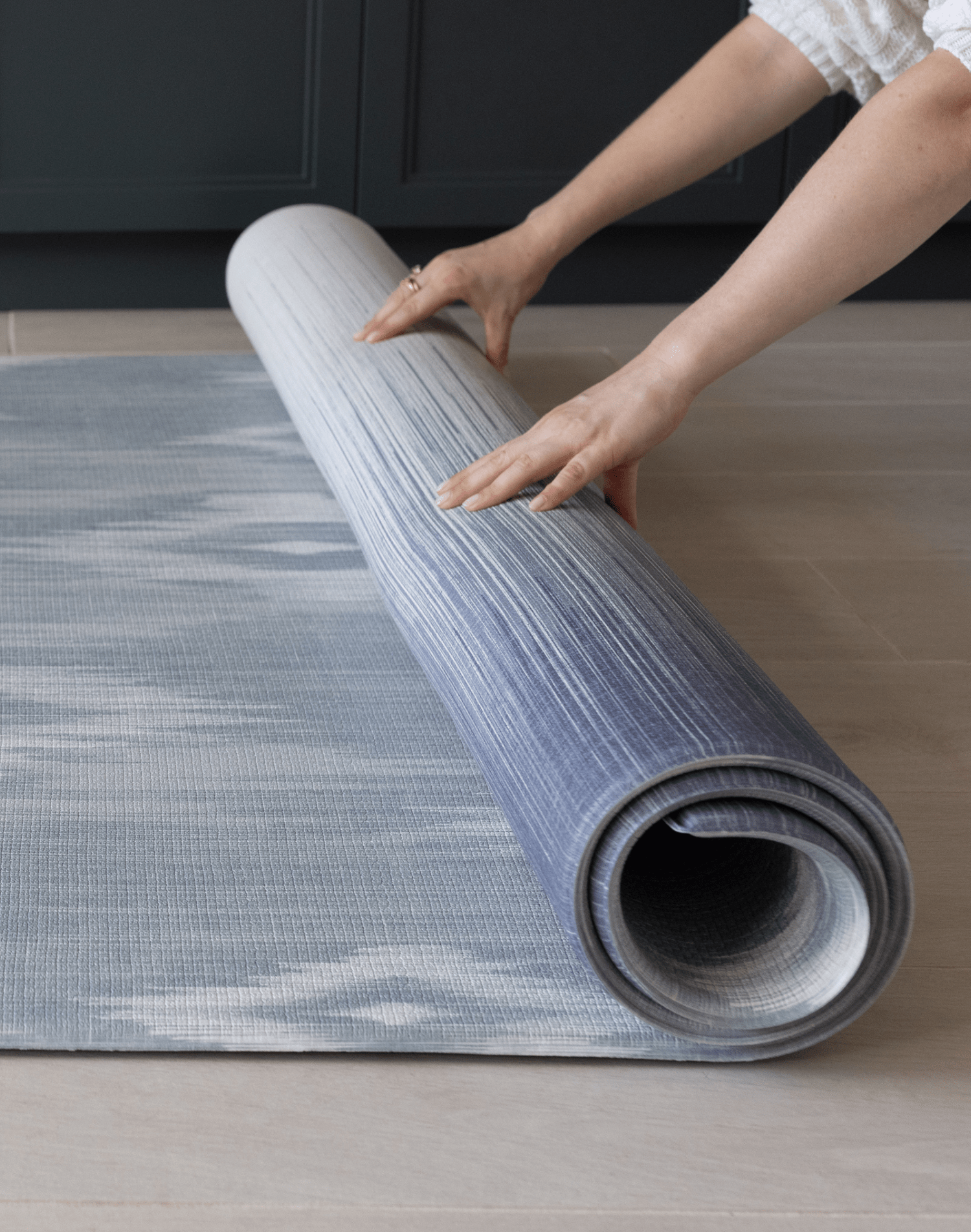 Unrolling Memory foam mat in blue and beige ikat print that looks modern in family homes perfect squishy surface for the whole family