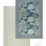 Close-up of double-sided Totter + Tumble luxury playmat in heritage William Morris florals, for stylish & safe nursery decor.