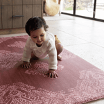 Baby girl crawls across large crawling playmat a spielmatte ideal for anywhere in the  home thick design for tiled flooring