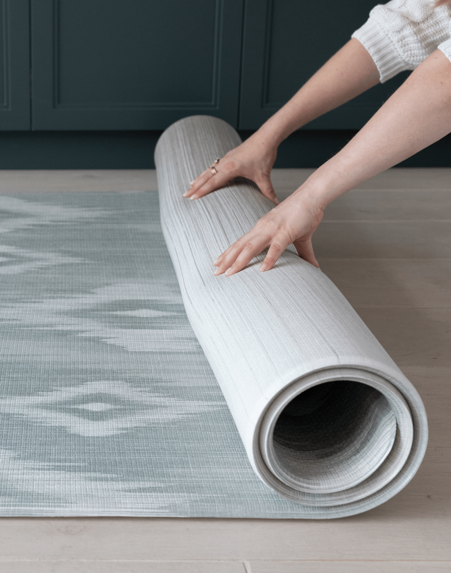 Rolling one piece Tumbling mats designed for safe floor play in a range of sizes and styles the Odissi is modern with a green and beige ikat design