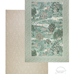 Close-up of reversible Totter + Tumble one-piece luxury playmats featuring heritage-inspired prints; designer nursery decor with timeless appeal.
