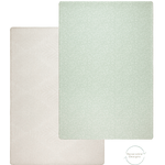 A reversible play mat with a neutral and calming aesthetic