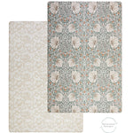 graphic showing the reversible sides of totter and tumble two sided playmat