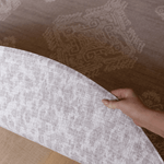 Hand pulls back the double sided grey playmat designed for the whole family to take to the floor in comfort textural patterns and subtle colourways designed with modern homes in mind