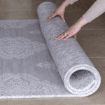 Unrolling the extra large grey play mat by totter and tumble the sepi with the reversible sunda on the opposite side large and comfy design allows for better floor play allowing all of the family to enjoy playing together even on hard flooring