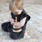 baby playing on totter and tumble playmat best baby buy that has great longevity throughout childhood and in tasteful designs for parents to enjoy too, great for christmas gifts for 1 year olds, baby shower presents.