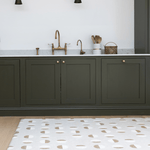 A beige kitchen floor mat that complements modern interior styling