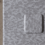 Memory foam playmat with grey leopard print design visit totter and tumble swatch service page to order a sample to try in your home feel the thick memory foam design and compare the design against your home decor