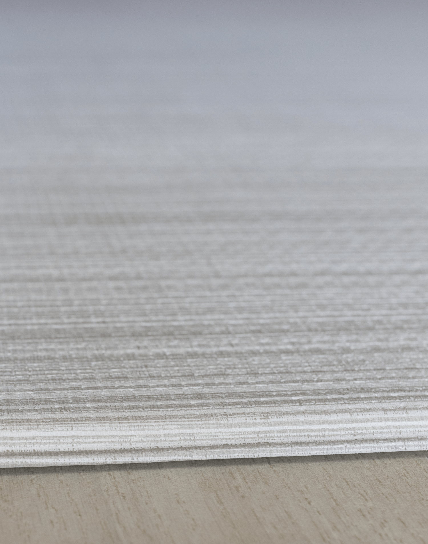 Close up of subtle gradient on the Tali Beige baby play mat made with memory foam