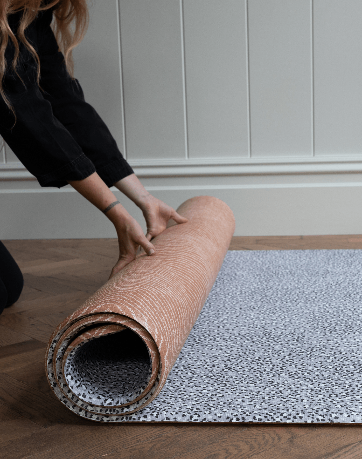 Hands roll out one piece tapis play mat with textured surface and thick memory foam