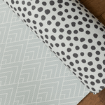 Luxury padded play mat with polka dot and grey designs