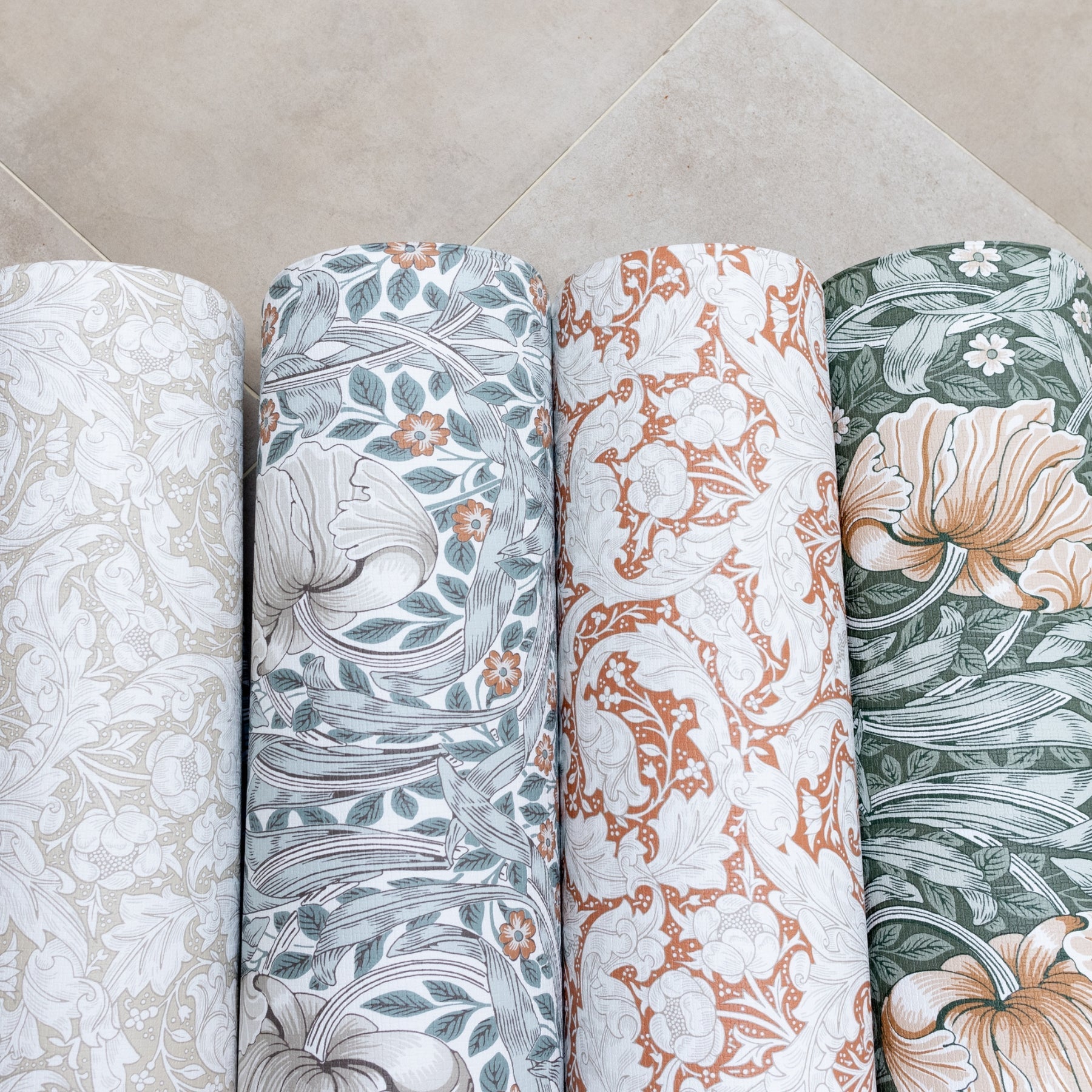 Rolled playmats in beautiful botanical and floral designs by Morris & Co