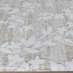 Close-up of cushion memory foam beige fabric with subtle floral pattern
tapis bébé design pour le salon