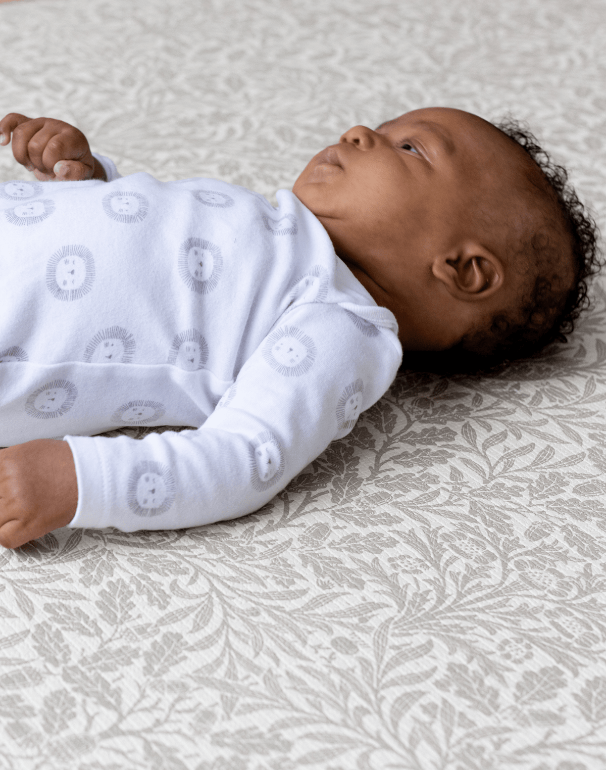 Baby on totter and tumble Acorn play mat from morris & co collection, thick padded playmats supportive for babies and safe from newborn non toxic
