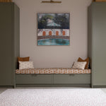 The Brecon XL, a nature-inspired playmat styled like a neutral baby rug in a family space