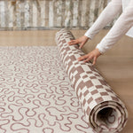 Easy to roll up The Brecon reversible playmat, a compact, wipeable baby mat in a handwoven style for modern, busy homes