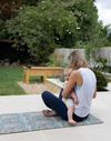 blackthorn play runner with mom and baby doing exercise baby yoga outdoors Spielmatte from totter + tumble