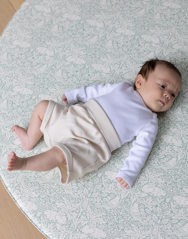 brer rabbit round playmat with baby playing and resting, calm and comfortable playmats in beautiful designs and comfortable memory foam playmats non toxic safe from newborn+