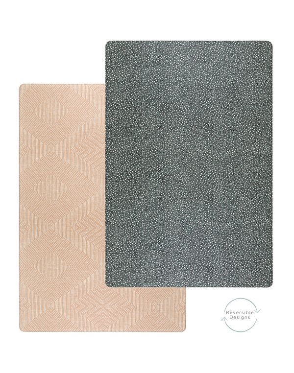 An understated play mat in neutral colors and simple lines