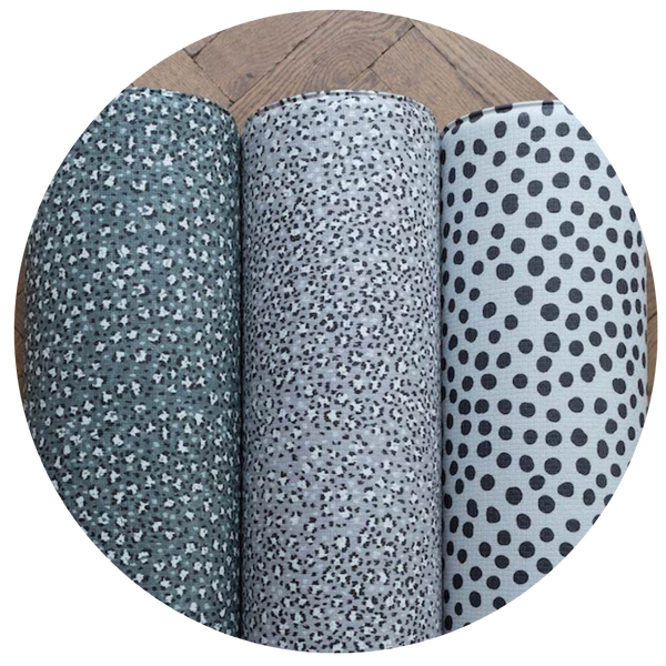 Totter and tumble padded play mats in reversible designs, onepiece, roll out, wipe down in monochrome prints to suit every family home