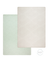 A neutral play mat that provides a peaceful environment