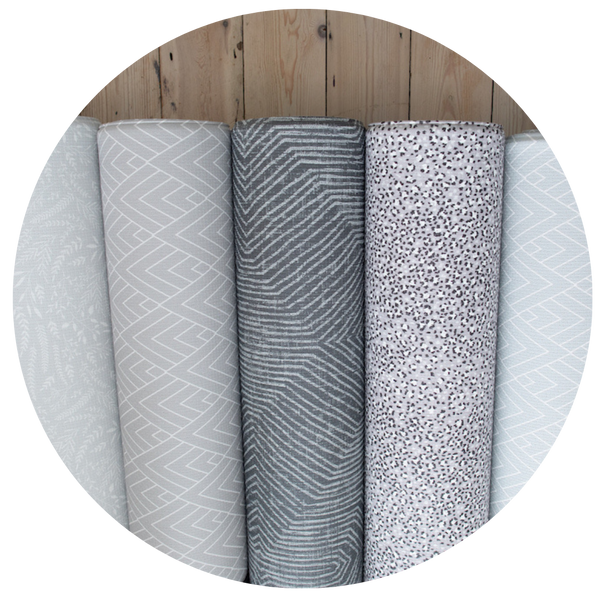 Totter and Tumble grey and neutral padded playmats suitable from newborn and great for the whole family. Grey padded memory foam play mat, onepiece, reversible, design-led for newborns, toddlers and grown ups alike!