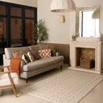 The Holbein playmat styled in a soft neutral living space, a large baby playmat for newborns and crawling babies.