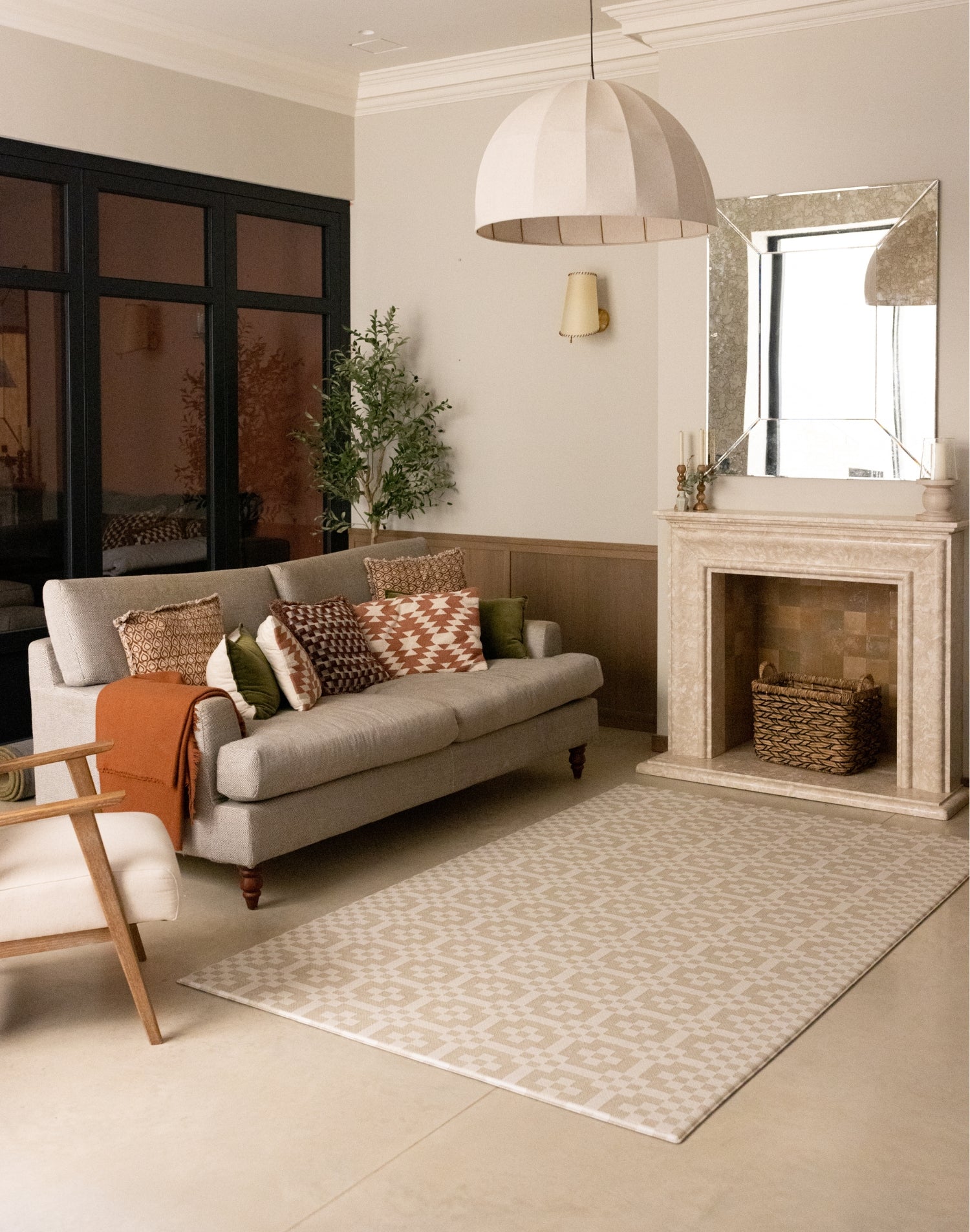 The Holbein playmat styled in a soft neutral living space, a large baby playmat for newborns and crawling babies.