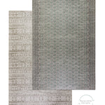 Two textured playmats layered showing reversible baby mat designs that look like Persian rugs