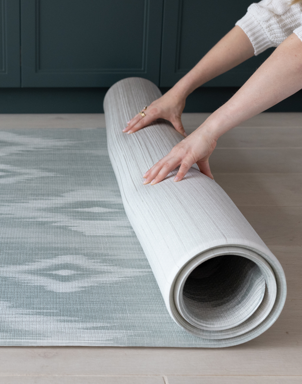 Rolling one piece Tumbling mats designed for safe floor play in a range of sizes and styles the Odissi is modern with a green and beige ikat design