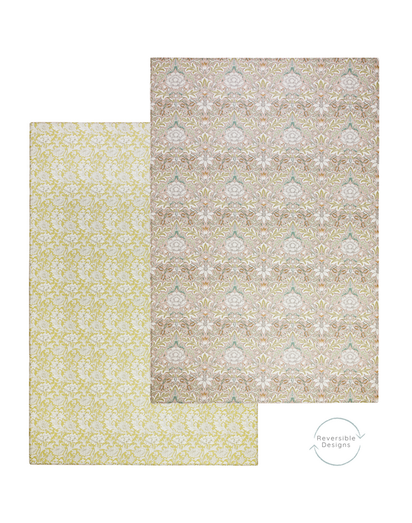 A play mat with a simple and muted two-sided pattern from the morris & Co. collaboration with totter and tumble