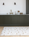 A beige kitchen floor mat that complements modern interior styling 
