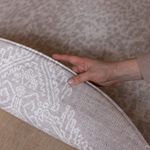 Hand pulls back the reversible padded playmat the sunda with two grey designs with modern motifs for the contemporary family home thick memory foam is ideal for keeping the family comfy during floorplay