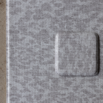 Memory foam playmat with grey leopard print design visit totter and tumble swatch service page to order a sample to try in your home feel the thick memory foam design and compare the design against your home decor