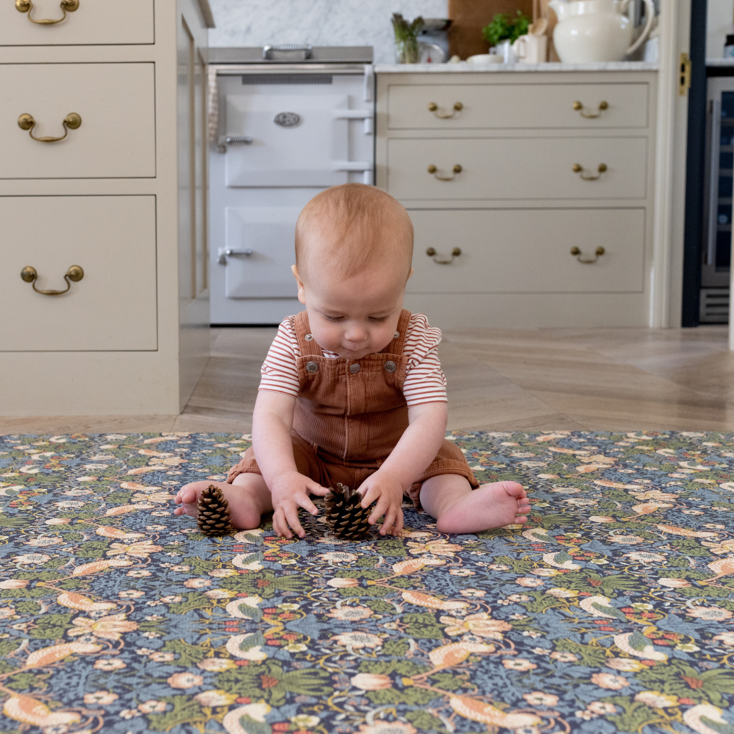 totter and tumble playmats baby playing in kitchen play mat padded to protect your little one, reversible morris & co designs to suit your home interior nursery decor playful strawberry thief 