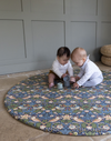 totter and tumble babies playing mat round shape non toxic safe play mats that suit your interior in reversible double sided designs and waterproof washable playmats that are easy to clean. Spielmatte