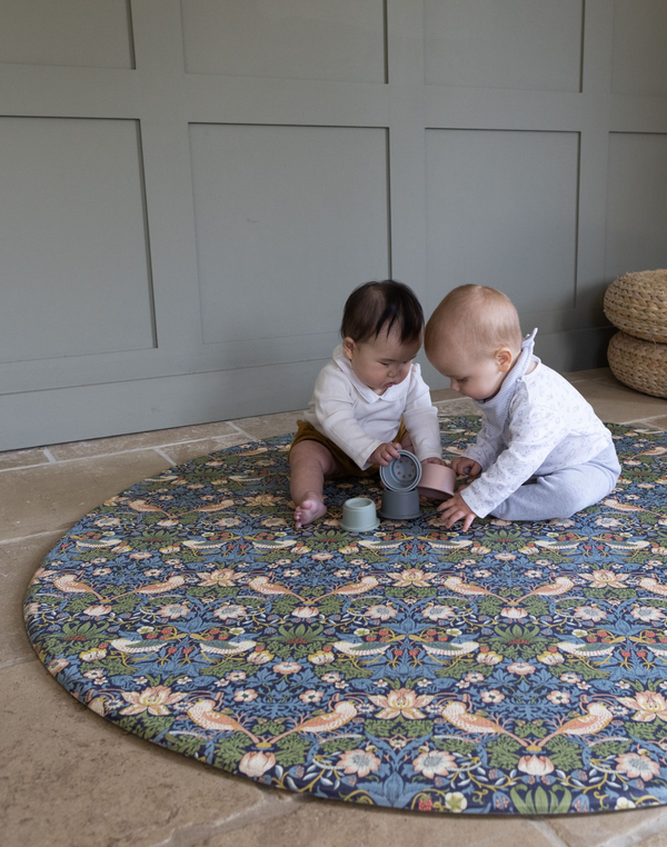 totter and tumble babies playing mat round shape non toxic safe play mats that suit your interior in reversible double sided designs and waterproof washable playmats that are easy to clean. Spielmatte