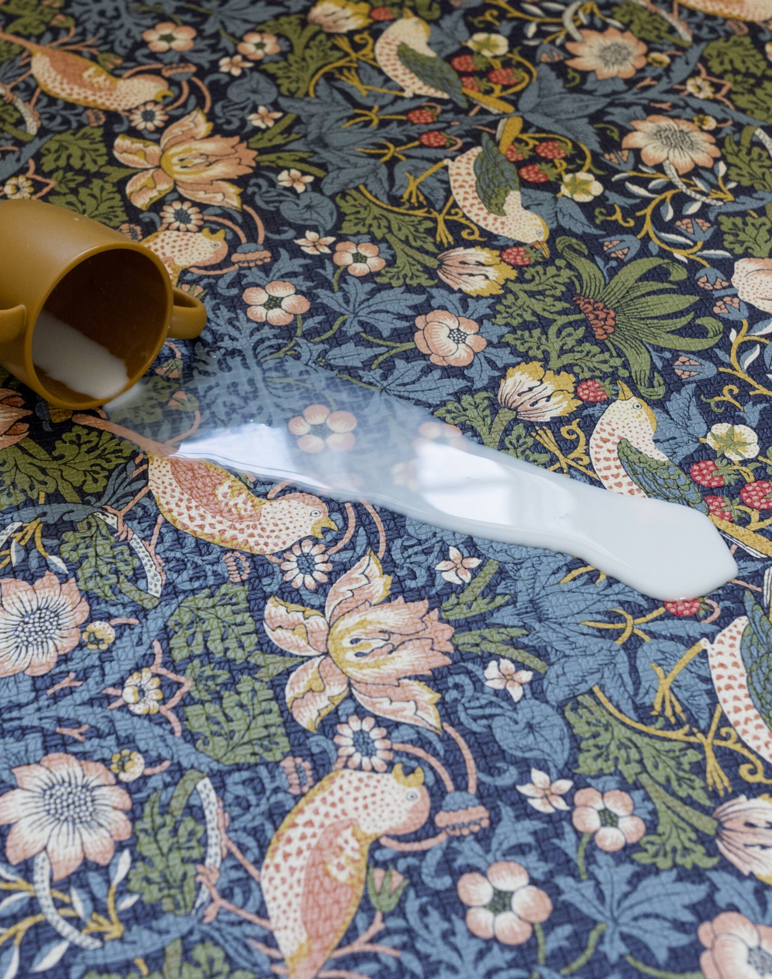 thick foam playing mat totter and tumble padded foam sealed non slip textured surface is waterproof and easy to clean wipedown playmats designed with the whole family in mind. beautiful morris & Co print in navy with birds and hedgerows