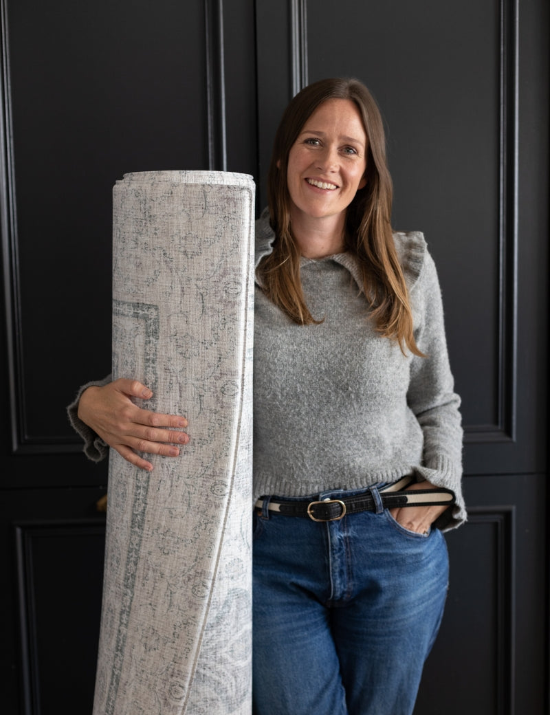 Susie Stubbs, founder of Totter + Tumble with an extra large playmat