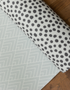 Luxury padded play mat with polka dot and grey designs 