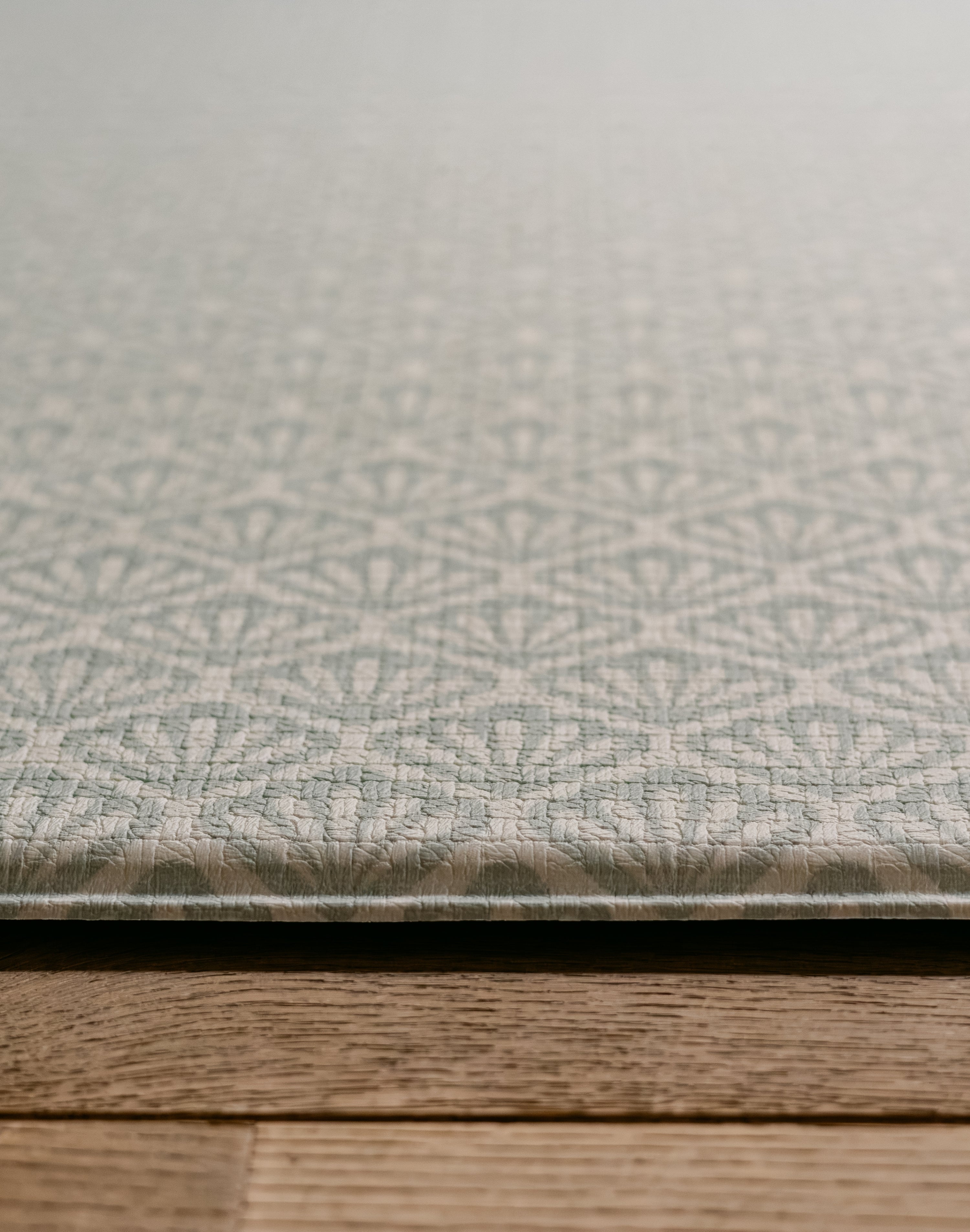 A close-up image on the shell design beachcomber playmat, made from thick memory foam | SKU: 26 BEACH/GATHER XL, 26 BEACH/GATHER STD, 26 BEACH/GATHER COMP