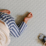 Baby crawling on the beachcomber rug-like, soft, safe, baby playmat from totter and tumble