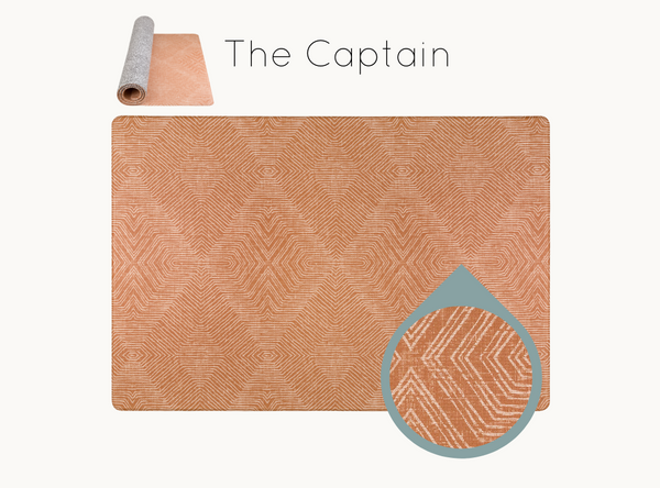 The Captain totter and tumble padded play mat for toddlers in warm terracotta tone waterproof playmat suitable from newborn. Stylish family home rug