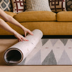 The Counter reversible memory foam playmat from Totter + Tumble rolling and The Wildcard