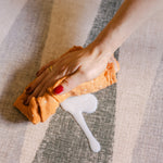 Wipe up on The Counter reversible memory foam playmat from Totter + Tumble