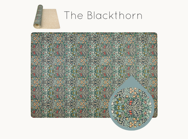 Timeless Morris & Co. Blackthorn print with jewel tones on an Oxford Blue background stylish playmat for family spaces