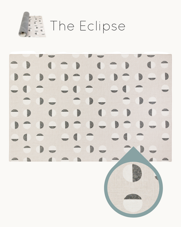 Stylish monochromatic eclipse inspired motif across modern memory foam, wipe clean playmat