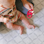 A baby sitting comfortably playing on a thick memory foam, safe non toxic totter and tumble playmat | SKU: 26 BEACH/GATHER XL, 26 BEACH/GATHER STD, 26 BEACH/GATHER COMP