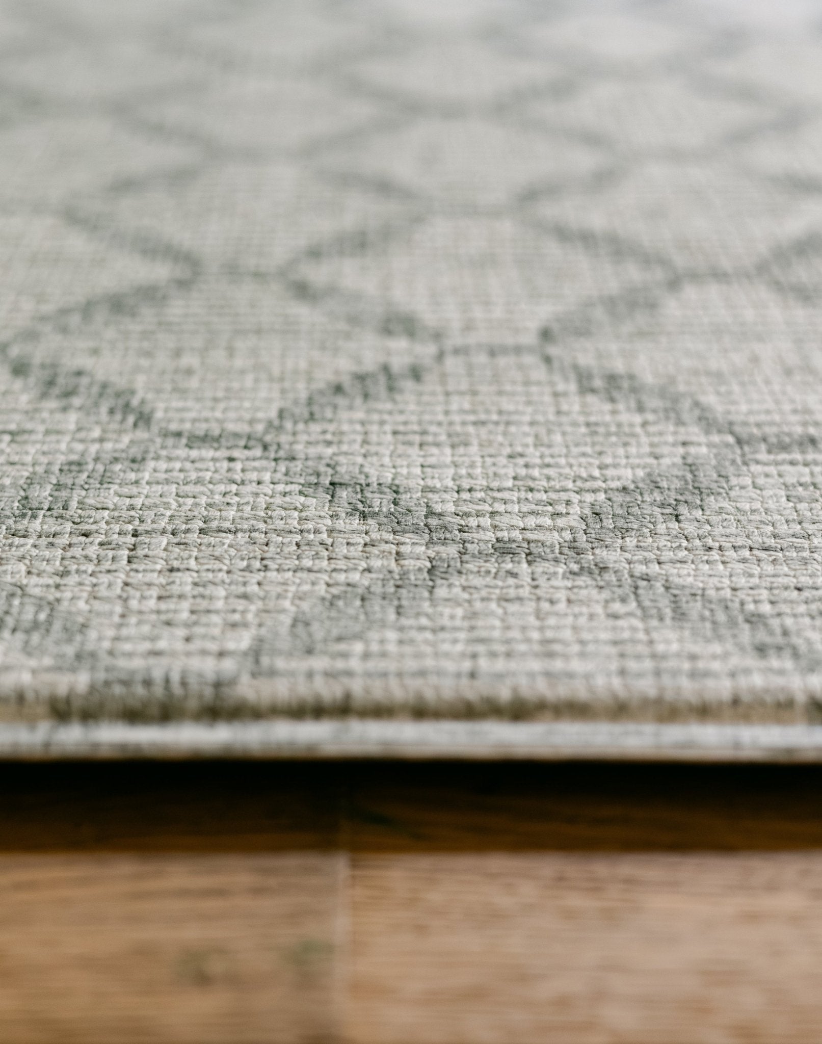 A close up of the thick memory foam, rug-like playmat from totter and tumble | SKU: 26 BEACH/GATHER XL, 26 BEACH/GATHER STD, 26 BEACH/GATHER COMP